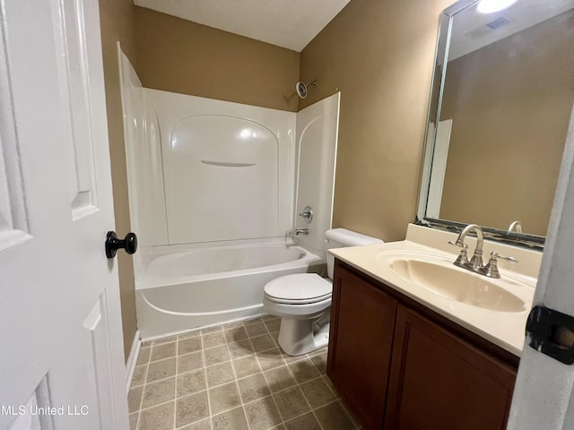bathroom with toilet, vanity, and tub / shower combination