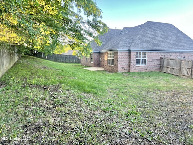 view of yard with a patio