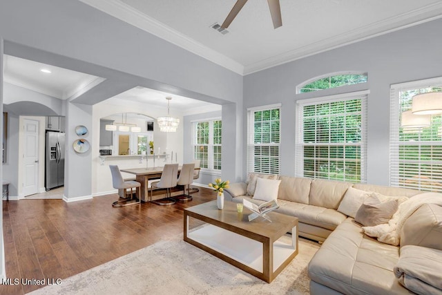 2252 Beach Dr Unit 206, Gulfport, MS 39507 - living area with wood finished floors, a chandelier, ornamental molding, and recessed lighting