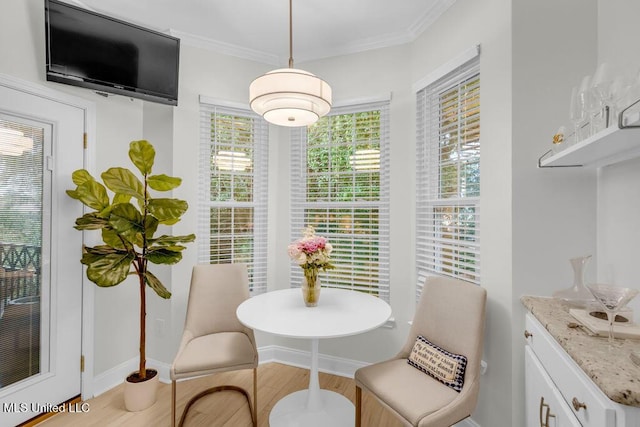 2252 Beach Dr Unit 206, Gulfport, MS 39507 - dining space with crown molding and wood finished floors