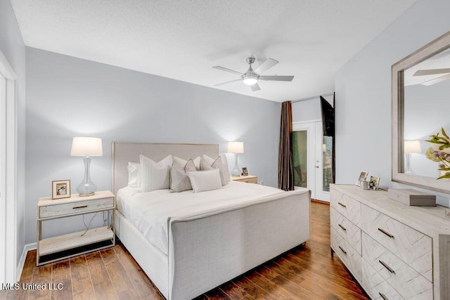 2252 Beach Dr Unit 206, Gulfport, MS 39507 - bedroom with wood finished floors and a ceiling fan