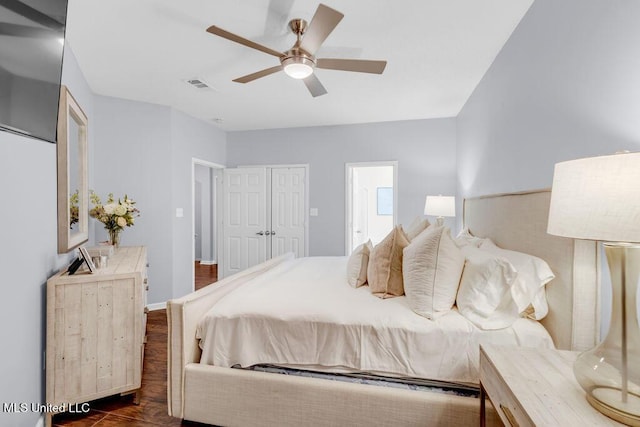 2252 Beach Dr Unit 206, Gulfport, MS 39507 - bedroom featuring dark wood finished floors and a ceiling fan