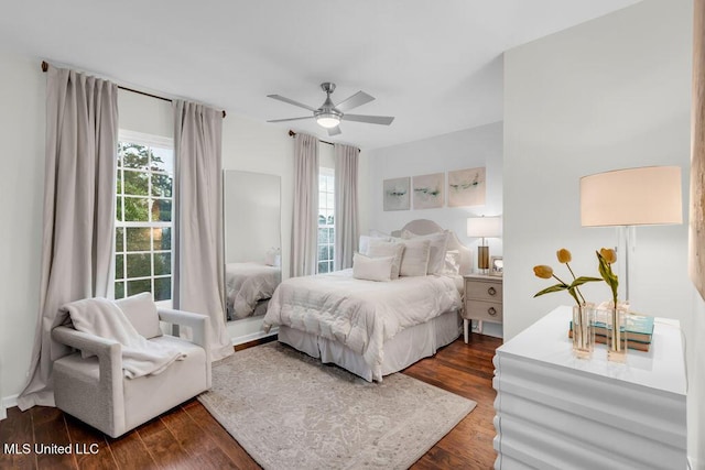 2252 Beach Dr Unit 206, Gulfport, MS 39507 - bedroom with dark wood finished floors and a ceiling fan