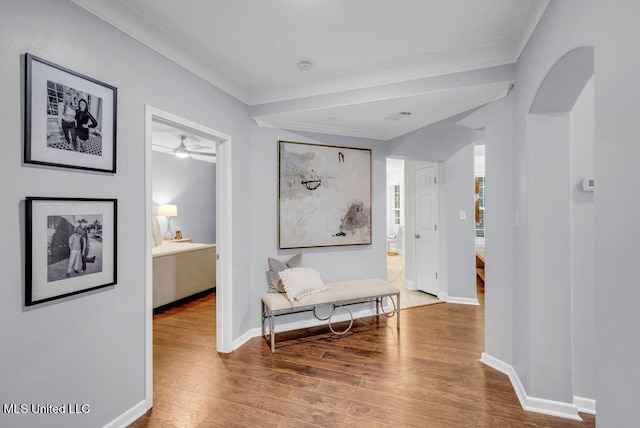 2252 Beach Dr Unit 206, Gulfport, MS 39507 - hallway featuring ornamental molding, wood finished floors, and arched walkways