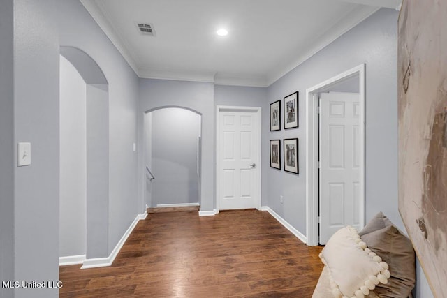 2252 Beach Dr Unit 206, Gulfport, MS 39507 - corridor featuring arched walkways, ornamental molding, wood finished floors, and recessed lighting