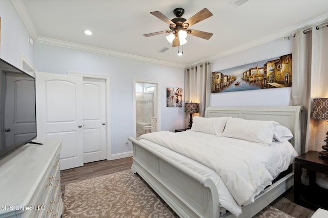 bedroom featuring connected bathroom, ornamental molding, ceiling fan, dark hardwood / wood-style floors, and a closet