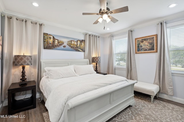 bedroom featuring ornamental molding, ceiling fan, and dark hardwood / wood-style floors