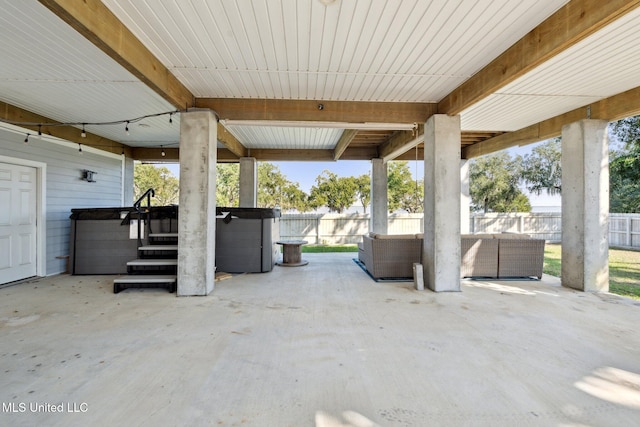 view of patio with a hot tub