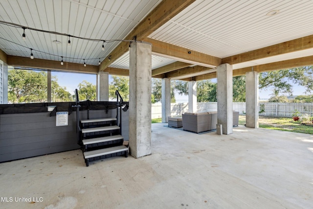 view of patio / terrace featuring a hot tub