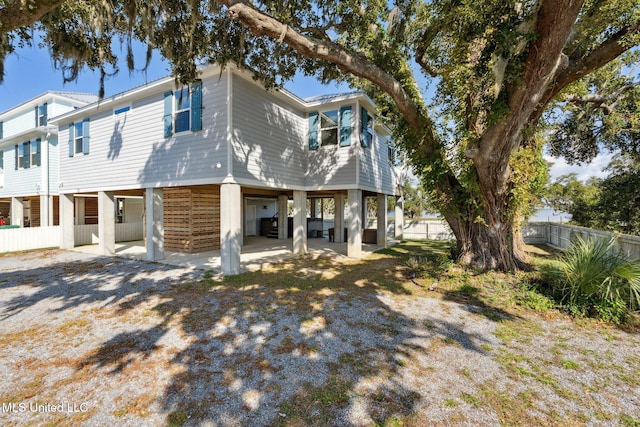 view of front of home featuring a patio