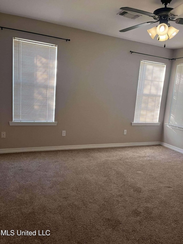703 E Canal St, Picayune, MS 39466 - unfurnished room with carpet floors and ceiling fan