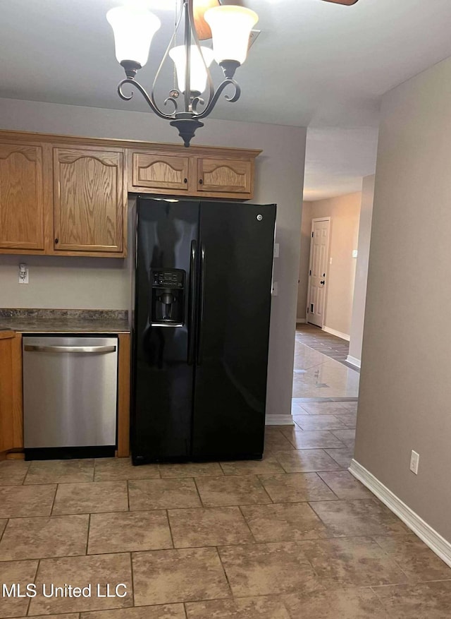 kitchen featuring black refrigerator with ice dispenser, dishwasher, decorative light fixtures, and a notable chandelier