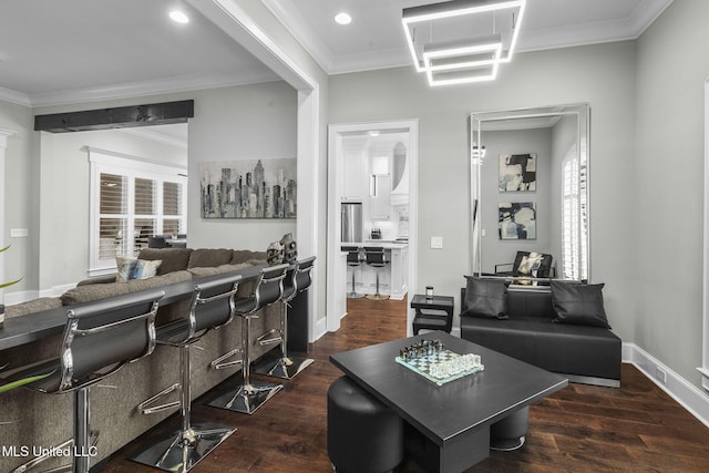 302 Covington Cv, Madison, MS 39110 - living room featuring dark wood-type flooring, crown molding, and recessed lighting