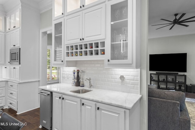 302 Covington Cv, Madison, MS 39110 - kitchen with open floor plan, white cabinets, tasteful backsplash, dark wood finished floors, and light stone countertops