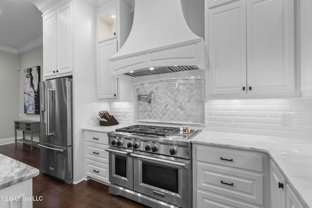 302 Covington Cv, Madison, MS 39110 - kitchen featuring custom range hood, high quality appliances, dark wood-style floors, white cabinets, and light stone counters