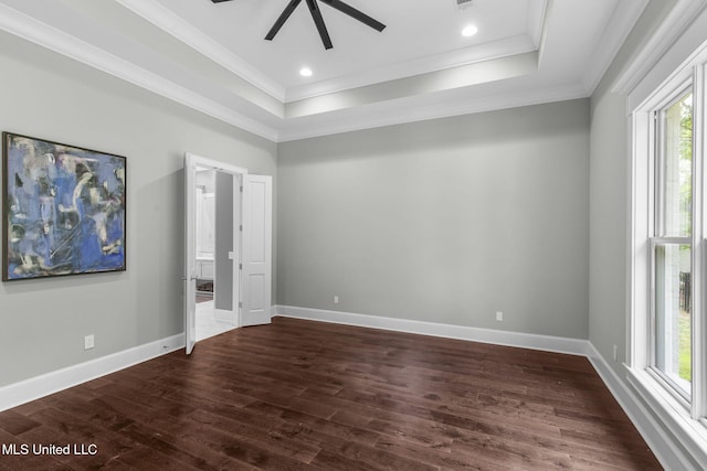 302 Covington Cv, Madison, MS 39110 - unfurnished bedroom with a tray ceiling, ornamental molding, dark wood finished floors, and a ceiling fan