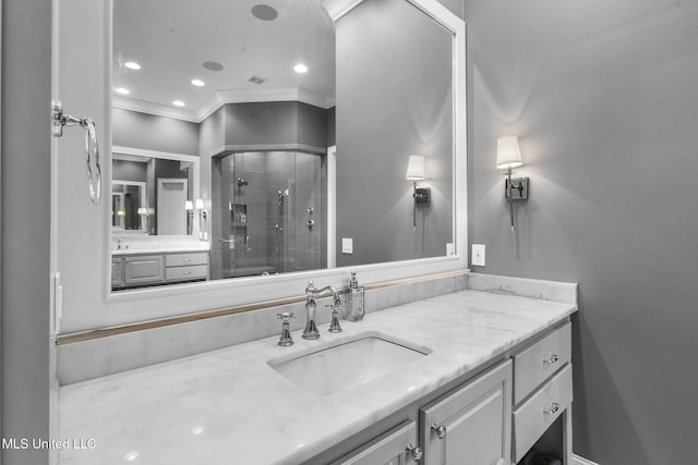 302 Covington Cv, Madison, MS 39110 - full bathroom featuring a shower stall, vanity, ornamental molding, and recessed lighting