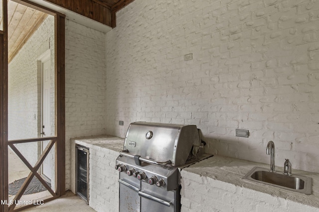 302 Covington Cv, Madison, MS 39110 - view of patio / terrace with wine cooler and an outdoor kitchen