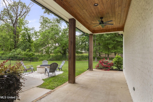 302 Covington Cv, Madison, MS 39110 - view of patio / terrace featuring an outdoor fire pit, a ceiling fan, and view of scattered trees