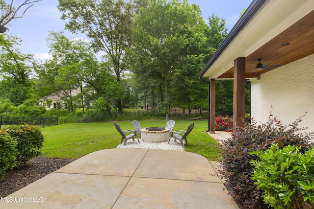 302 Covington Cv, Madison, MS 39110 - view of patio / terrace featuring an outdoor fire pit, ceiling fan, and view of scattered trees