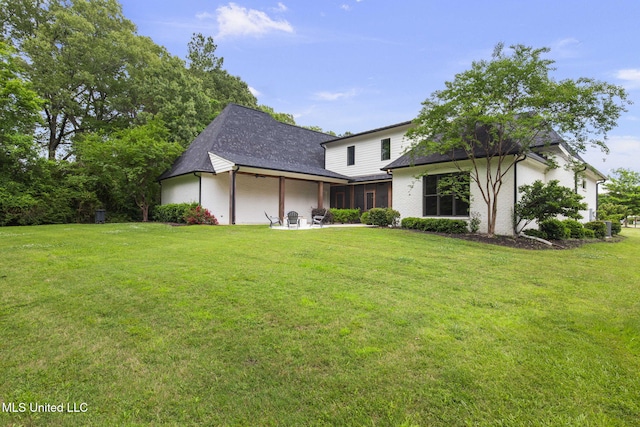 302 Covington Cv, Madison, MS 39110 - view of front facade with a front yard, a patio area, and roof with shingles