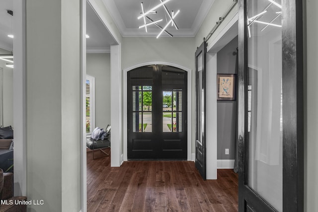 302 Covington Cv, Madison, MS 39110 - entryway with dark wood-style flooring, ornamental molding, and a barn door