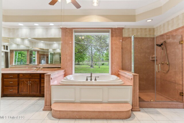 421 Starling Dr, Slidell, LA 70461 - bathroom featuring vanity, ornamental molding, a shower stall, a garden tub, and ceiling fan