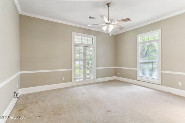 421 Starling Dr, Slidell, LA 70461 - carpeted empty room with baseboards, visible vents, ornamental molding, and a healthy amount of sunlight