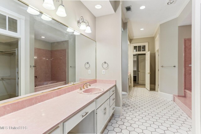421 Starling Dr, Slidell, LA 70461 - full bathroom featuring vanity, baseboards, visible vents, and crown molding