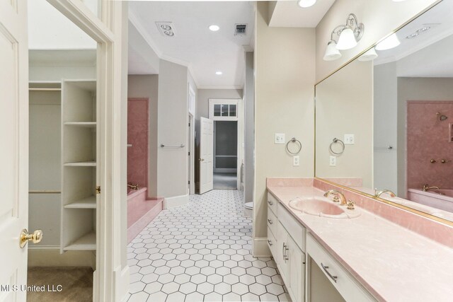 421 Starling Dr, Slidell, LA 70461 - full bath with vanity, baseboards, visible vents, ornamental molding, and recessed lighting