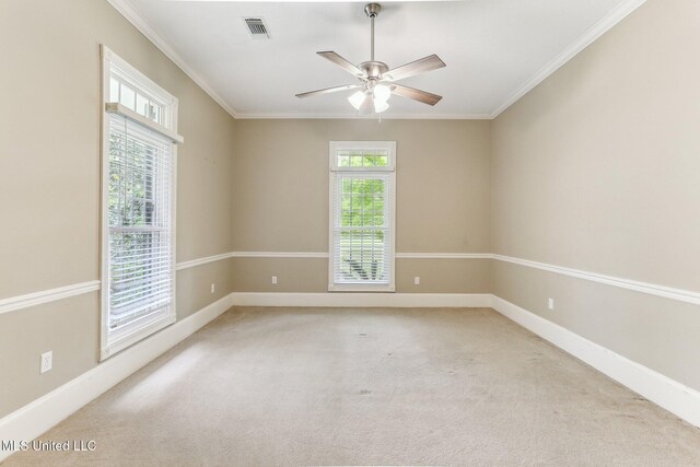 421 Starling Dr, Slidell, LA 70461 - spare room with a ceiling fan, carpet floors, crown molding, and visible vents