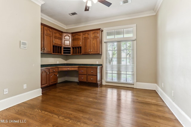421 Starling Dr, Slidell, LA 70461 - kitchen featuring visible vents, built in desk, dark countertops, dark wood-type flooring, and open shelves