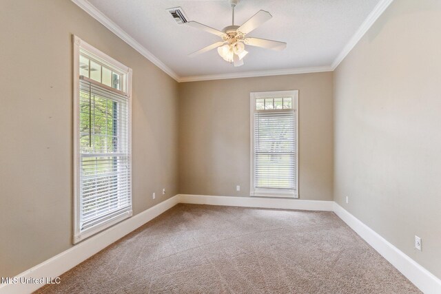 421 Starling Dr, Slidell, LA 70461 - empty room with crown molding, carpet flooring, baseboards, visible vents, and ceiling fan