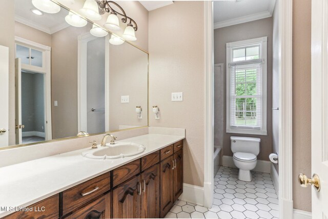 421 Starling Dr, Slidell, LA 70461 - full bath featuring baseboards, ornamental molding, toilet, tile patterned floors, and vanity