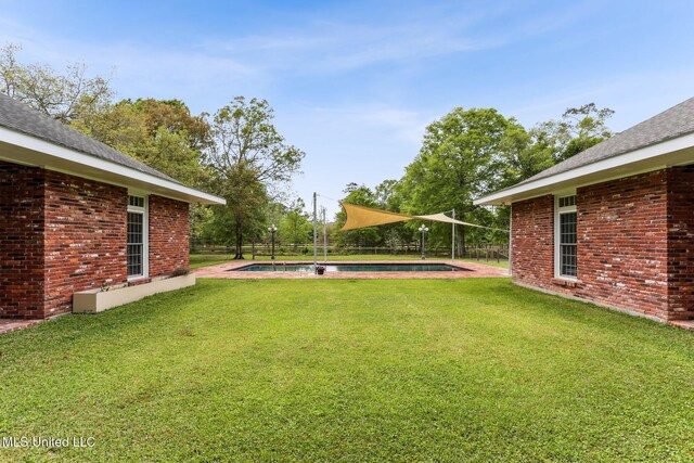 421 Starling Dr, Slidell, LA 70461 - view of yard with a fenced in pool and fence