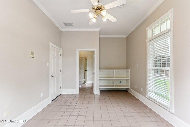 421 Starling Dr, Slidell, LA 70461 - spare room featuring crown molding, a ceiling fan, light tile patterned floors, visible vents, and a healthy amount of sunlight