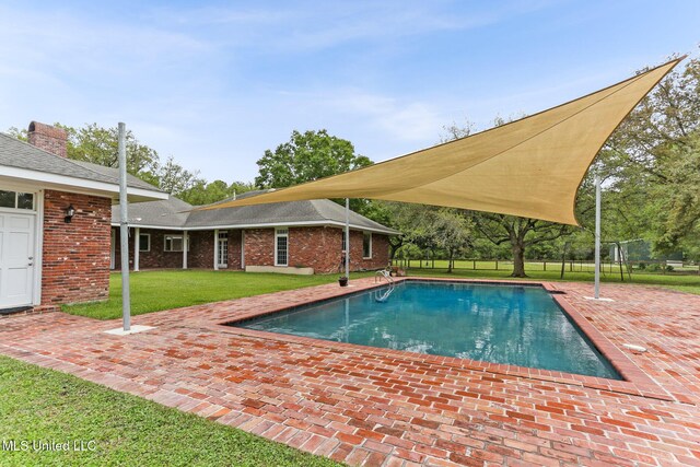 421 Starling Dr, Slidell, LA 70461 - view of pool with a fenced in pool, fence, a yard, and a patio area