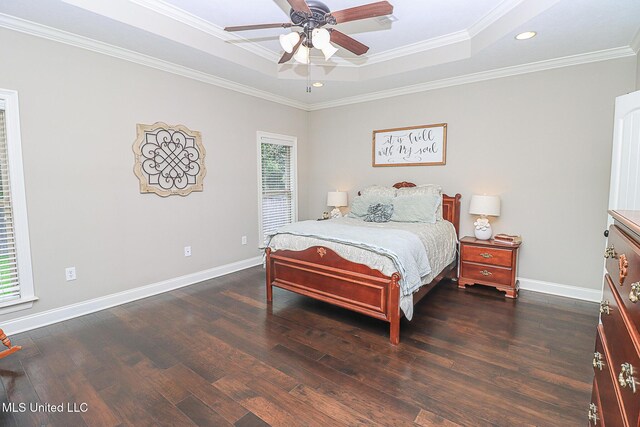 109 Elizabeth Dr, Brandon, MS 39042 - bedroom featuring a raised ceiling, dark wood finished floors, recessed lighting, ornamental molding, and baseboards