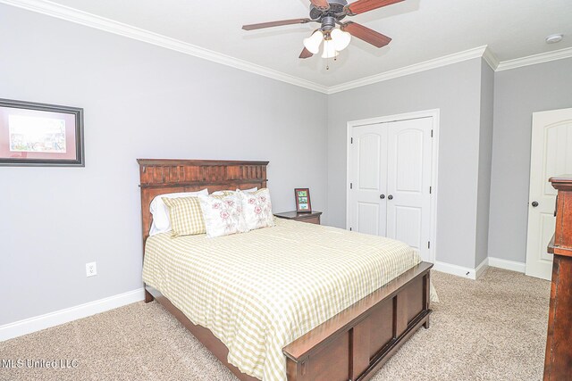 109 Elizabeth Dr, Brandon, MS 39042 - bedroom with carpet, baseboards, ornamental molding, a closet, and ceiling fan