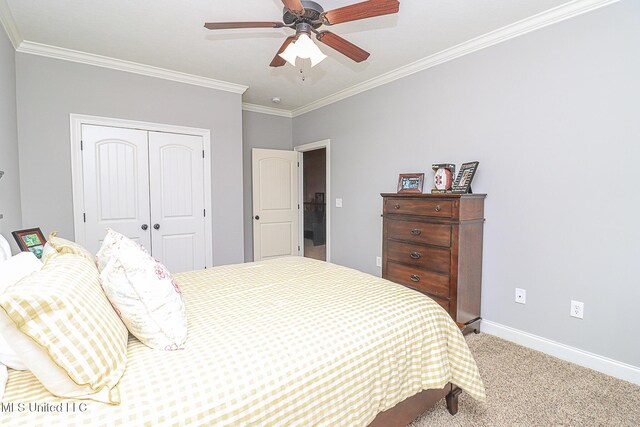 109 Elizabeth Dr, Brandon, MS 39042 - bedroom with carpet flooring, a closet, ornamental molding, baseboards, and a ceiling fan