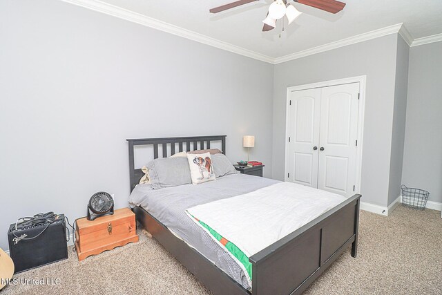 109 Elizabeth Dr, Brandon, MS 39042 - bedroom featuring light colored carpet, crown molding, baseboards, a closet, and ceiling fan