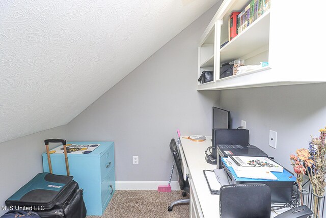 109 Elizabeth Dr, Brandon, MS 39042 - home office with carpet, vaulted ceiling, a textured ceiling, and baseboards
