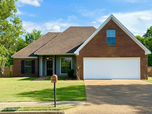 view of front facade with a front lawn and a garage