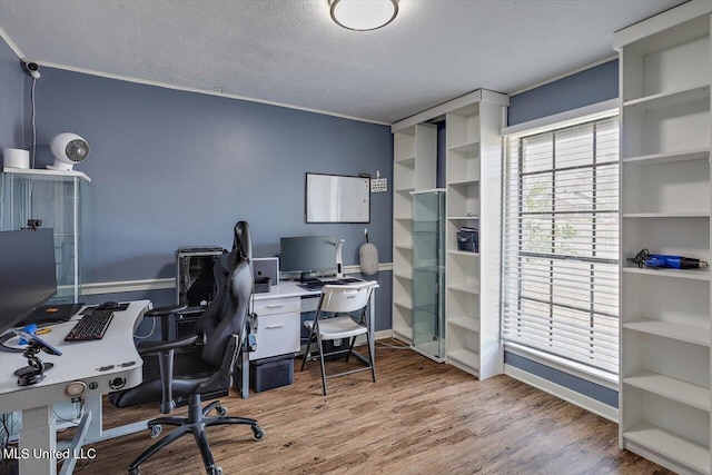 office area featuring hardwood / wood-style flooring and a textured ceiling