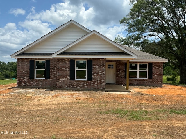 10 E Twin Oaks Ln, Carriere, MS 39426 - view of front of home featuring brick siding and a shingled roof