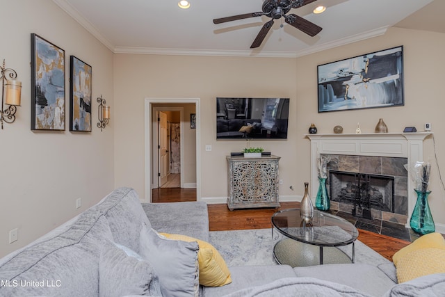 127 Palin Dr, Madison, MS 39110 - living room featuring wood finished floors, ornamental molding, a ceiling fan, a fireplace, and recessed lighting