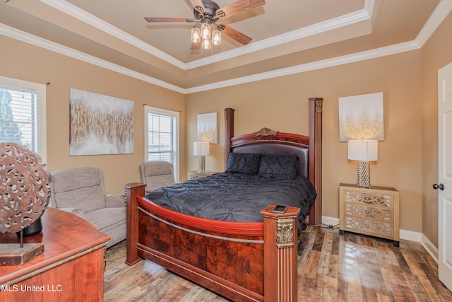 127 Palin Dr, Madison, MS 39110 - bedroom with wood-type flooring, a tray ceiling, crown molding, and ceiling fan