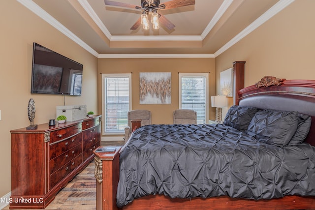 127 Palin Dr, Madison, MS 39110 - bedroom with a raised ceiling, wood finished floors, crown molding, and a ceiling fan