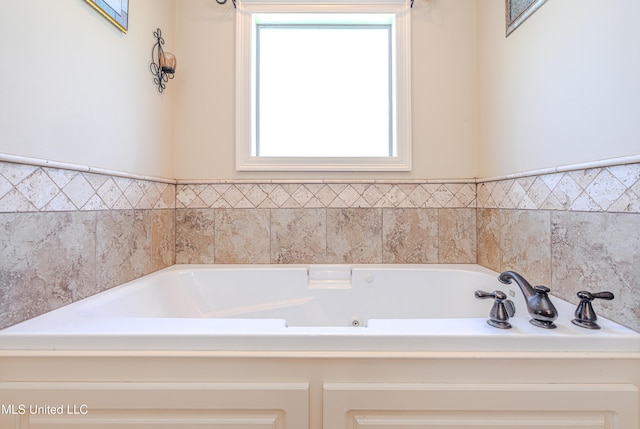 127 Palin Dr, Madison, MS 39110 - bathroom featuring a whirlpool tub and plenty of natural light