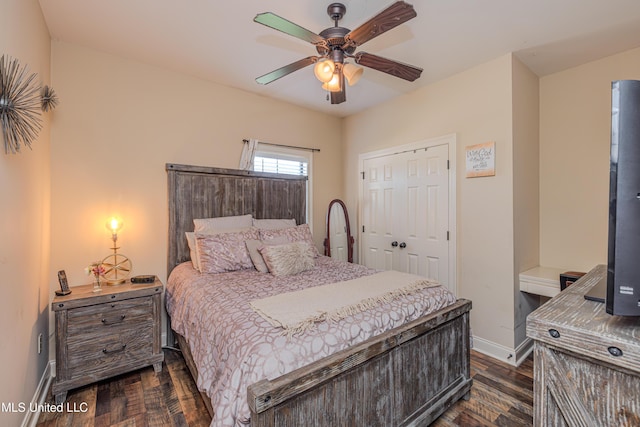 127 Palin Dr, Madison, MS 39110 - bedroom with dark wood-style flooring, a closet, and ceiling fan